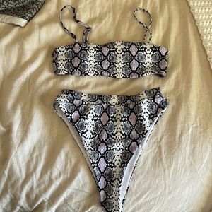 Bikini set. High waisted bottoms Top is adjustable & has removable padding.